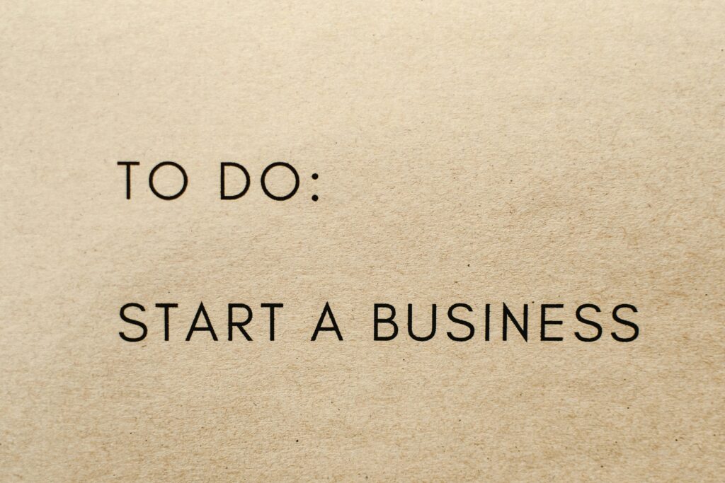 A close-up shot of a to-do list with 'Start a Business' written on it.